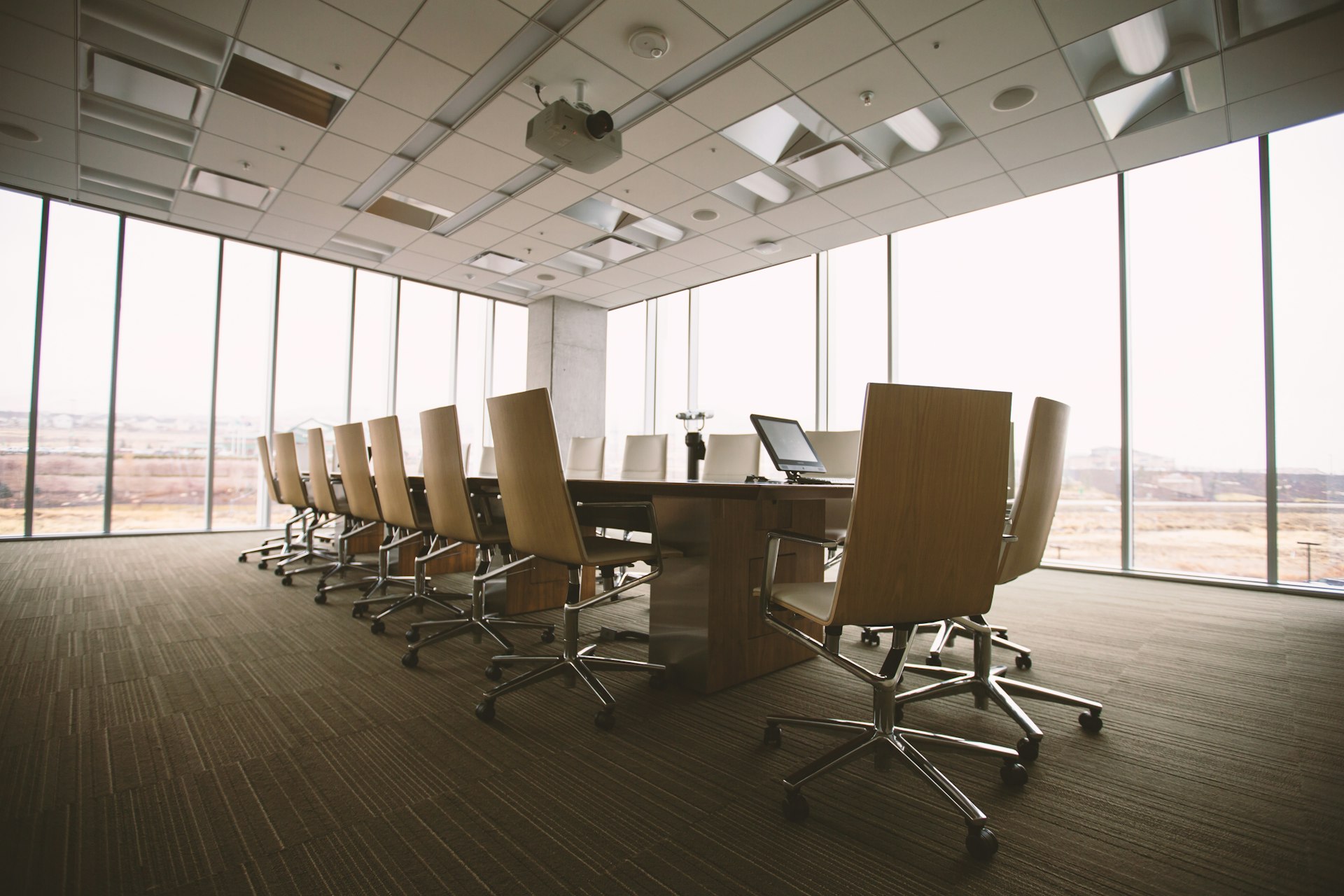 Boardroom table — executive-level engagement at GRC'ore